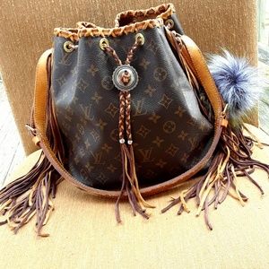 Louis Vuitton noe pm fringed